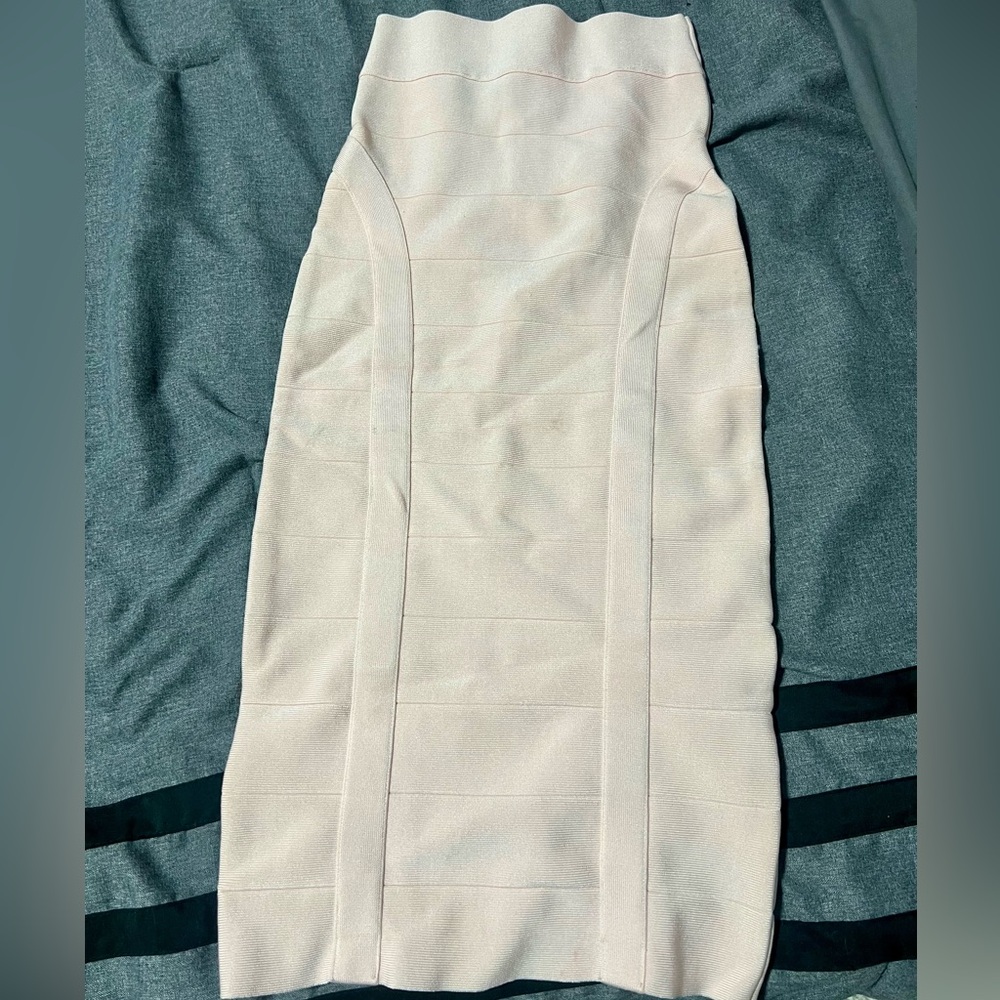 Light pink midi pencil skirt from Bebe.